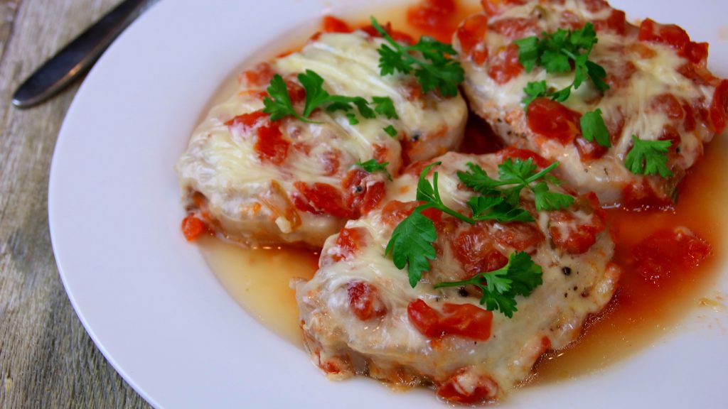 porkchops with tomato and cheese