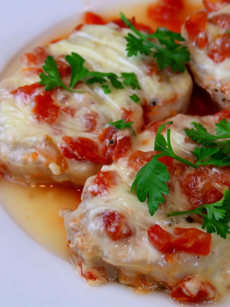 porkchops with tomato and cheese