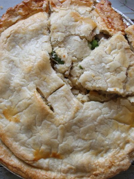 Golden homemade chicken pot pie baked in a flaky pie crust.