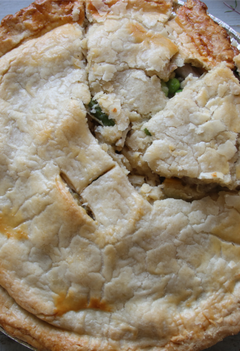 Golden homemade chicken pot pie baked in a flaky pie crust.