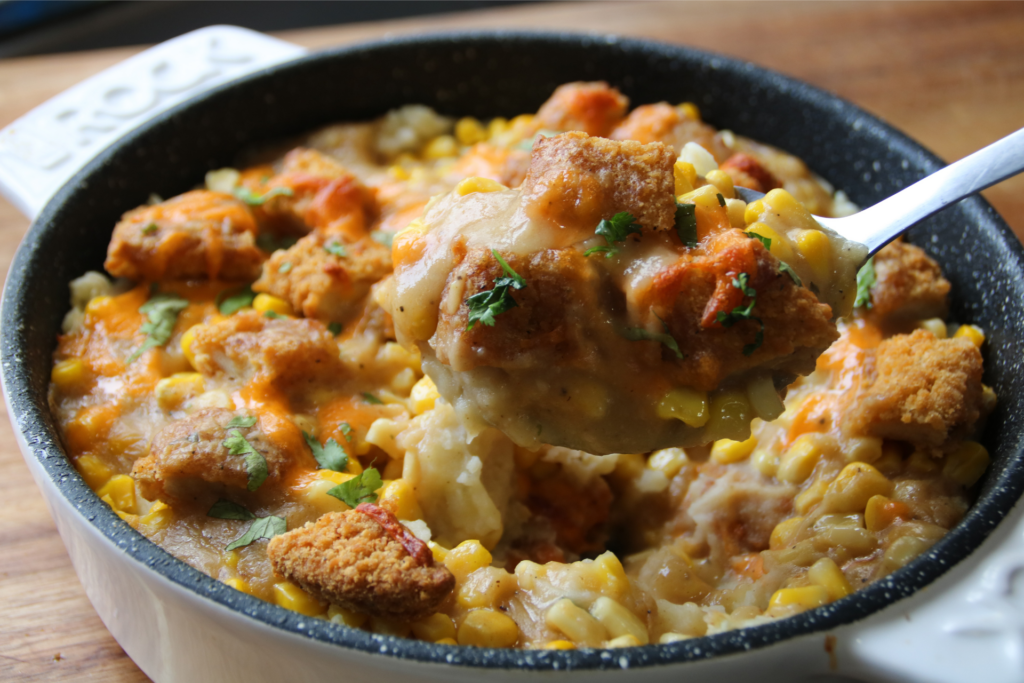 KFC Chicken Bowl Bake served with crispy chicken, mashed potatoes, corn, gravy, and melted cheese