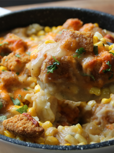KFC Chicken Bowl Bake served with crispy chicken, mashed potatoes, corn, gravy, and melted cheese