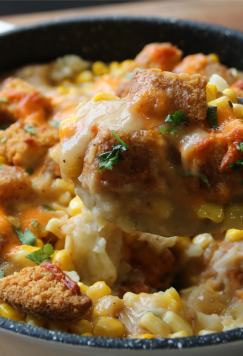 KFC Chicken Bowl Bake served with crispy chicken, mashed potatoes, corn, gravy, and melted cheese
