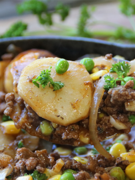 Old School Ground Beef and Potato Supper in a cast iron skillet