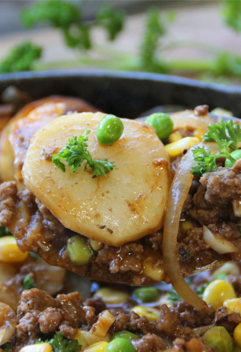 Old School Ground Beef and Potato Supper in a cast iron skillet