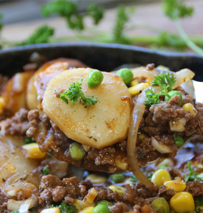 Old School Ground Beef and Potato Supper in a cast iron skillet