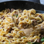 Back When Supper Was Simple one-pan creamy beef and noodles served in a cast iron skillet.