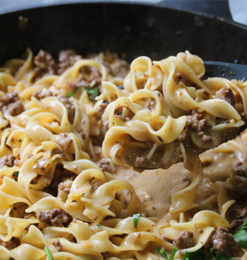 Back When Supper Was Simple one-pan creamy beef and noodles served in a cast iron skillet.