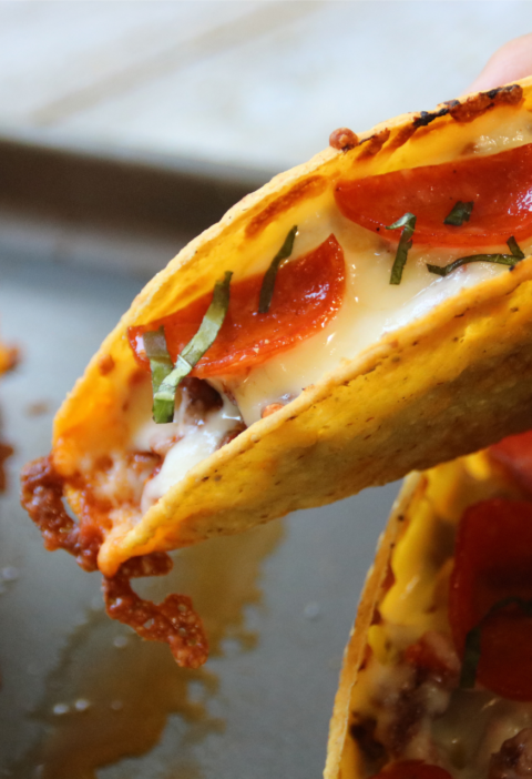 Crispy pizza tacos filled with seasoned ground beef, pizza sauce, mozzarella and pepperoni