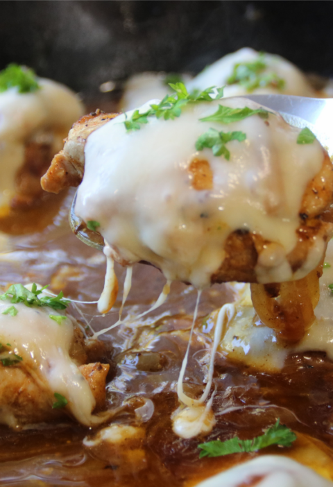 Timeless French Onion Chicken with melted Swiss cheese and caramelized onions in a rich savory gravy