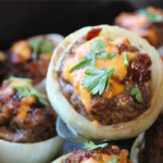 Dad's Stuffed Onion Bombs filled with seasoned ground beef, bacon and melted cheddar cheese