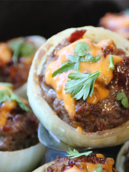 Dad's Stuffed Onion Bombs filled with seasoned ground beef, bacon and melted cheddar cheese