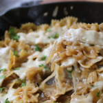 Old Cook's French Onion Pasta with caramelized onions, bow-tie pasta, and melted Swiss cheese